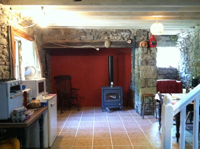 the living room, still with temporary kitchen