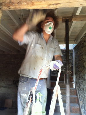 Masked Mike shoring up doorway